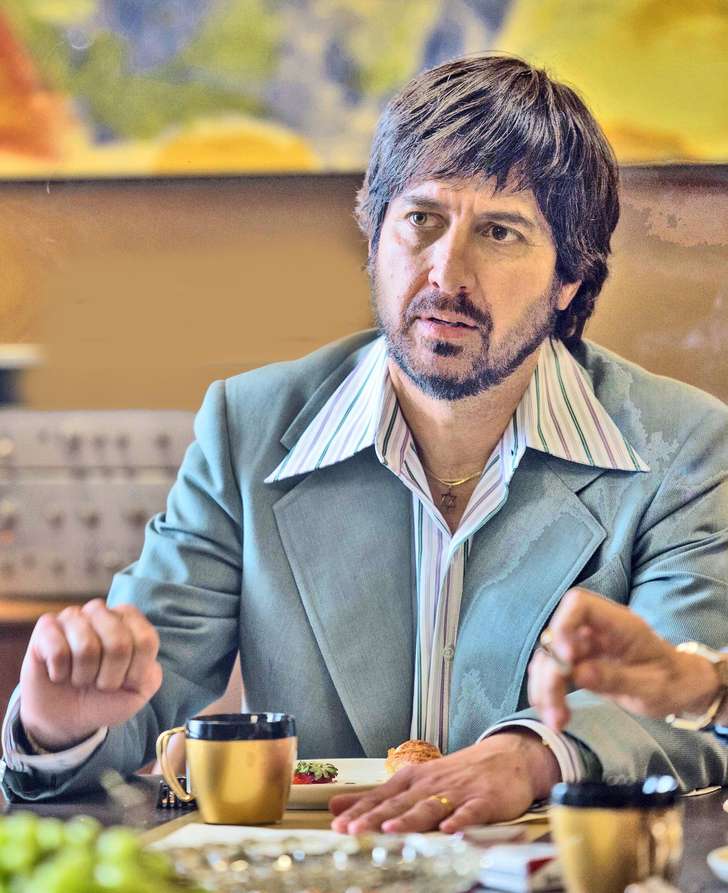 Ray Romano plays promotion manager and partner in a struggling record company in HBO’s tale of the music industry of the ’70s, “Vinyl.”